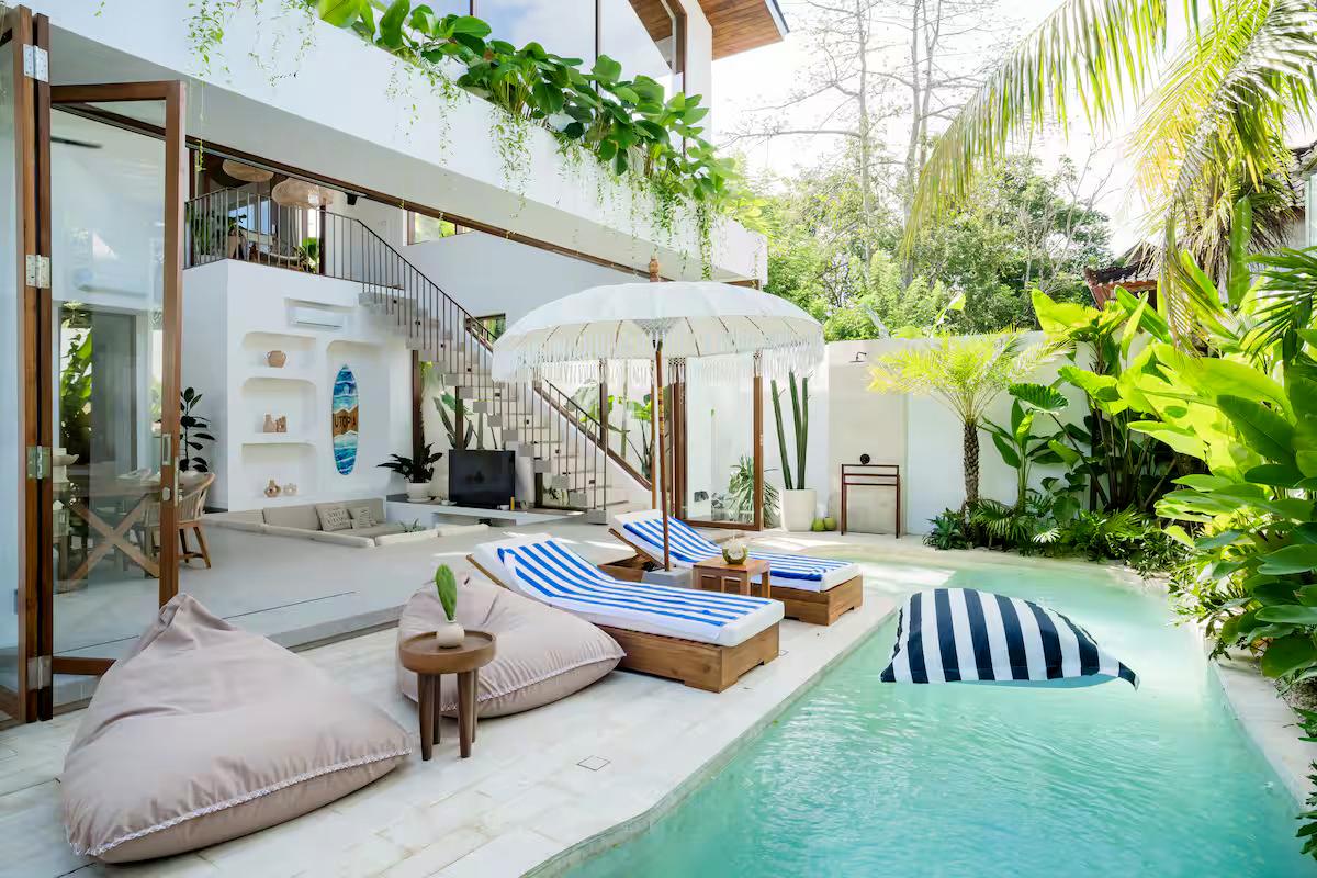 Poolside loungers at a Bali villa