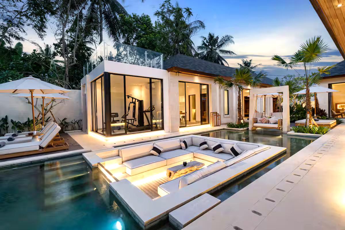 Sunken lounge by the pool at a Bali villa in the evening